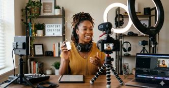 Female Content Creator recording a video in a home studio