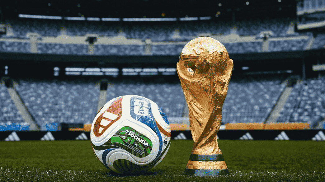 FIFA World Cup trophy and official match ball representing the 2026 FIFA World Cup final and its first-ever halftime show.