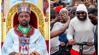 Olu of Warri Ogiame Atuwatse III in royal regalia and riding a scooter