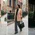 Person restyling a repeat outfit with different accessories
